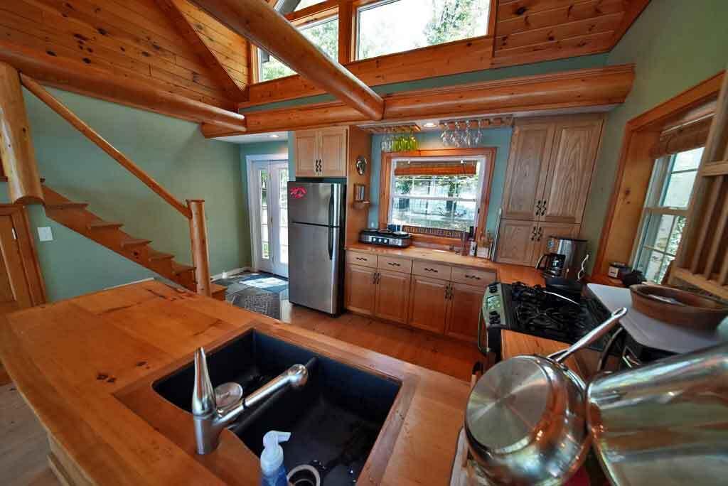 101 South South Shore Road Linneus, ME 04730 - Photo 35 of 95 kitchen-oak-cabinet-open-ar