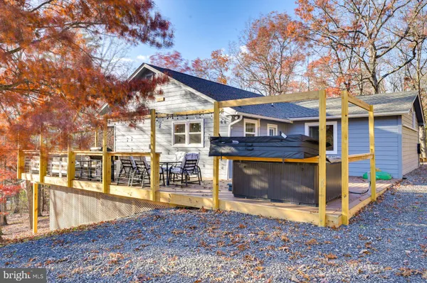 a view of a house with large windows
