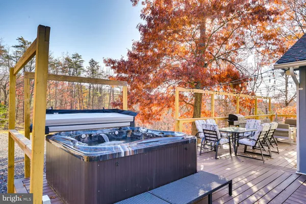 a view of outdoor sitting area with furniture