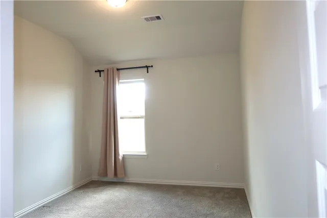 a view of empty room with window