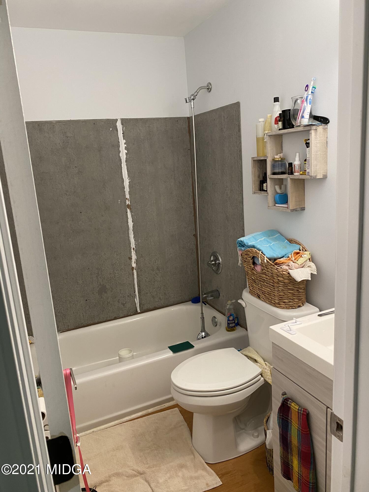 1351 Taylor Road Juliette, GA 31046 - Photo 5 of 14 a bathroom with a toilet and a shower