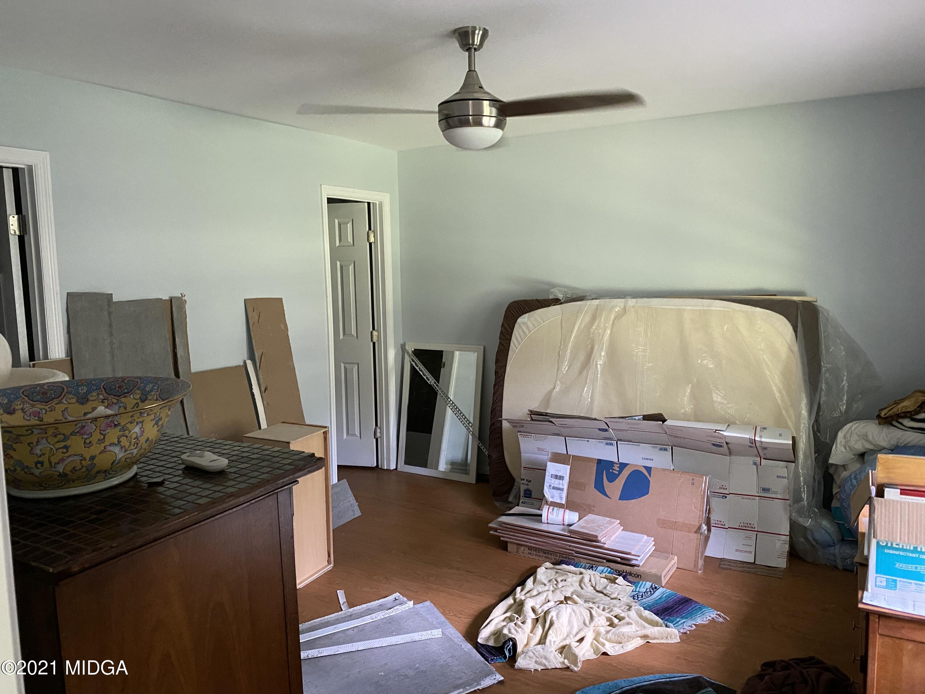 1351 Taylor Road Juliette, GA 31046 - Photo 6 of 14 a living room with furniture and a wooden floor