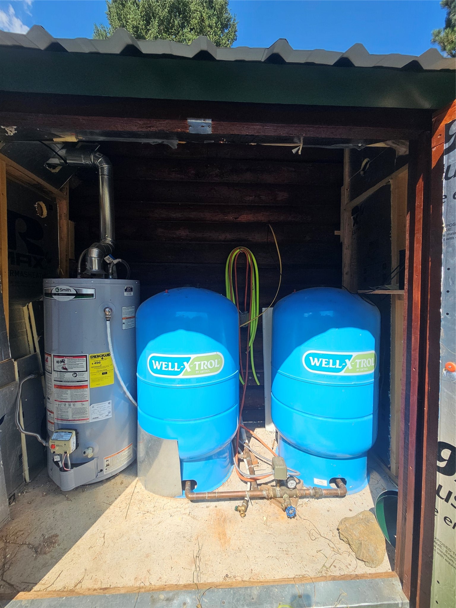 8880 Elk Trail Loop Lincoln, MT 59639 - Photo 21 of 55 attached to the kitchen cabin, hot water heater and pressure tanks