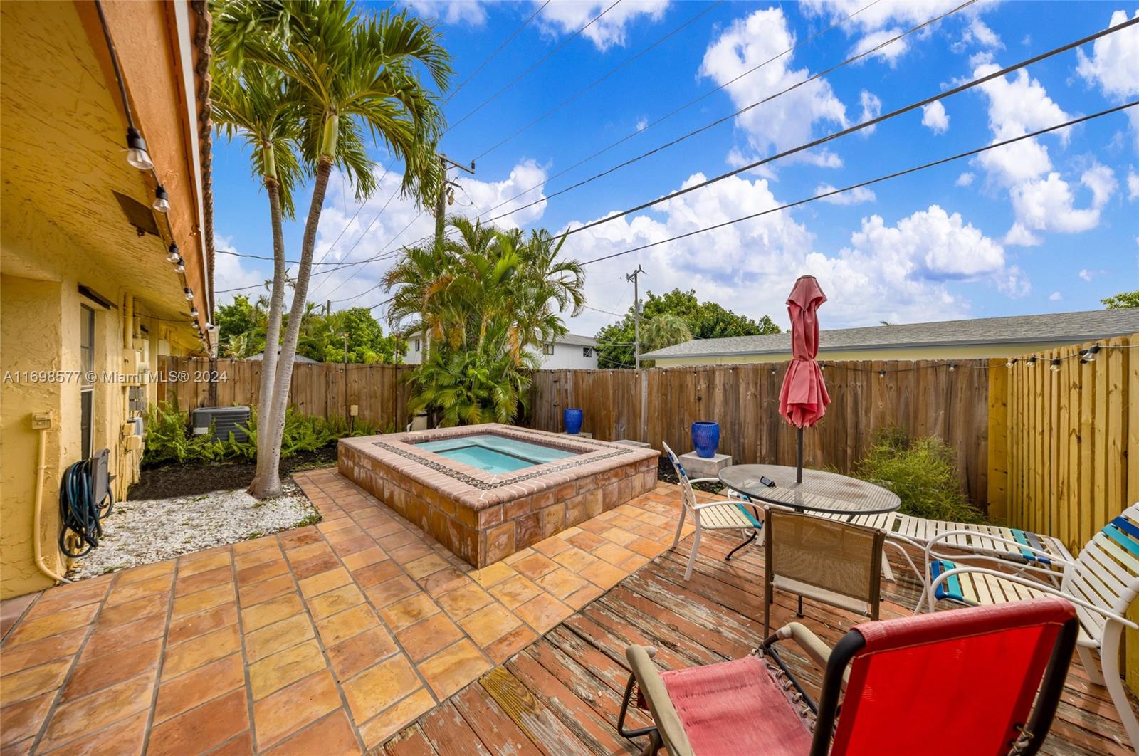 4440 Northeast 5th Avenue Boca Raton, FL 33431 - Photo 2 of 50 a view of a backyard with furniture