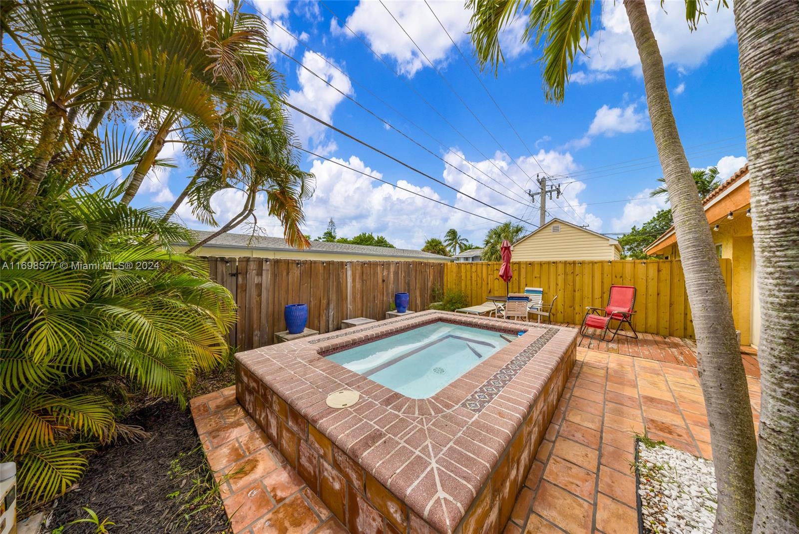 4440 Northeast 5th Avenue Boca Raton, FL 33431 - Photo 3 of 50 a view of a backyard with a small pool