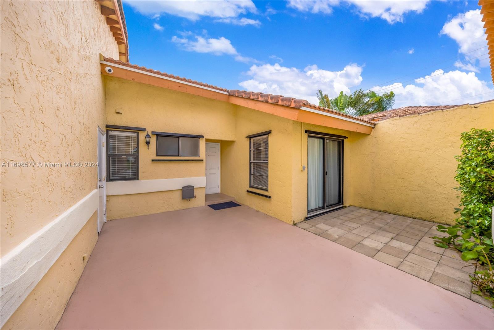 4440 Northeast 5th Avenue Boca Raton, FL 33431 - Photo 6 of 50 a view of a house with porch and wooden floor