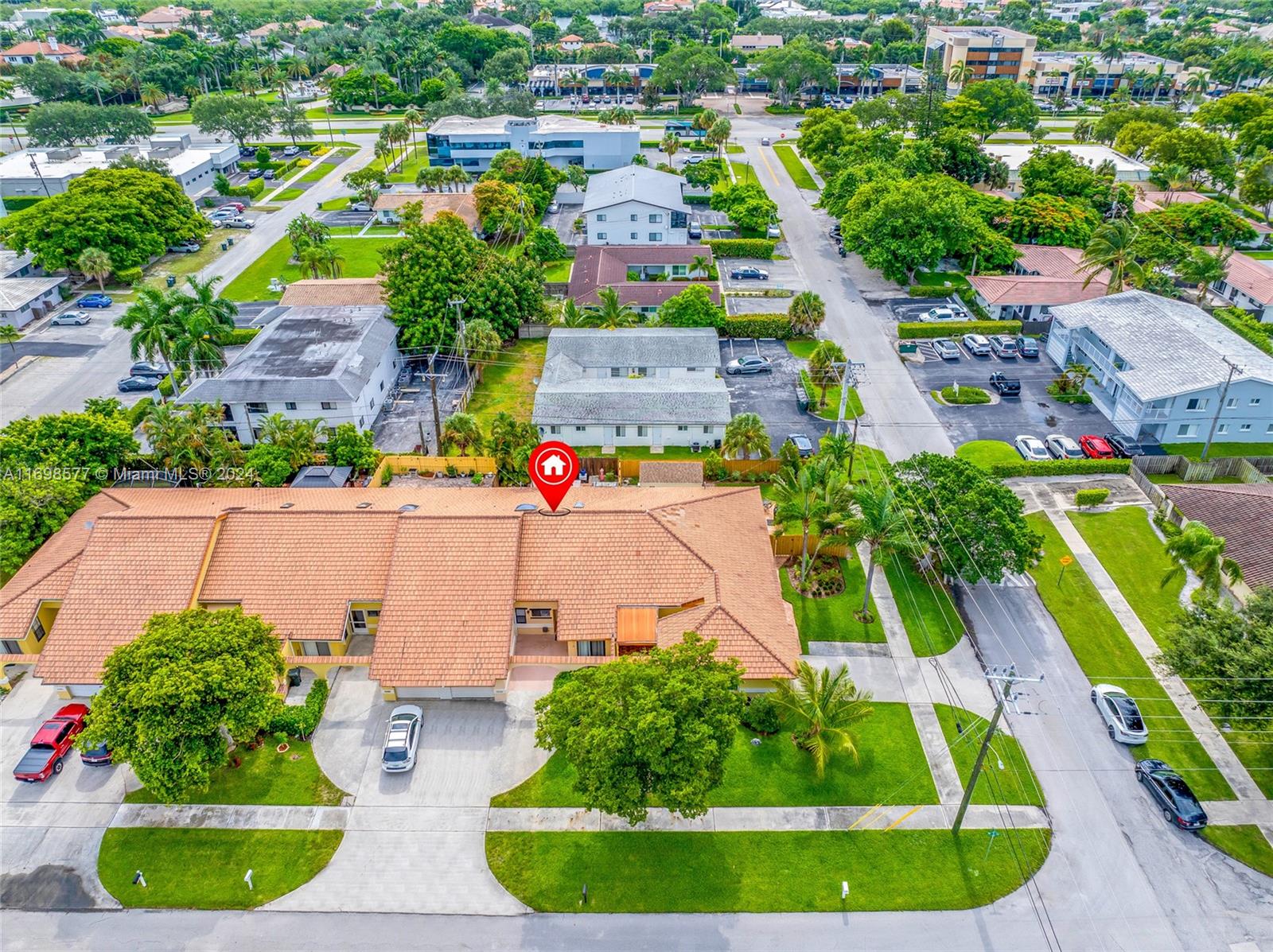 4440 Northeast 5th Avenue Boca Raton, FL 33431 - Photo 8 of 50 an aerial view of a house with a garden and lake view