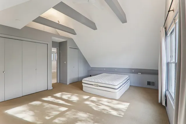 a bathroom with a sink a bathtub and a mirror