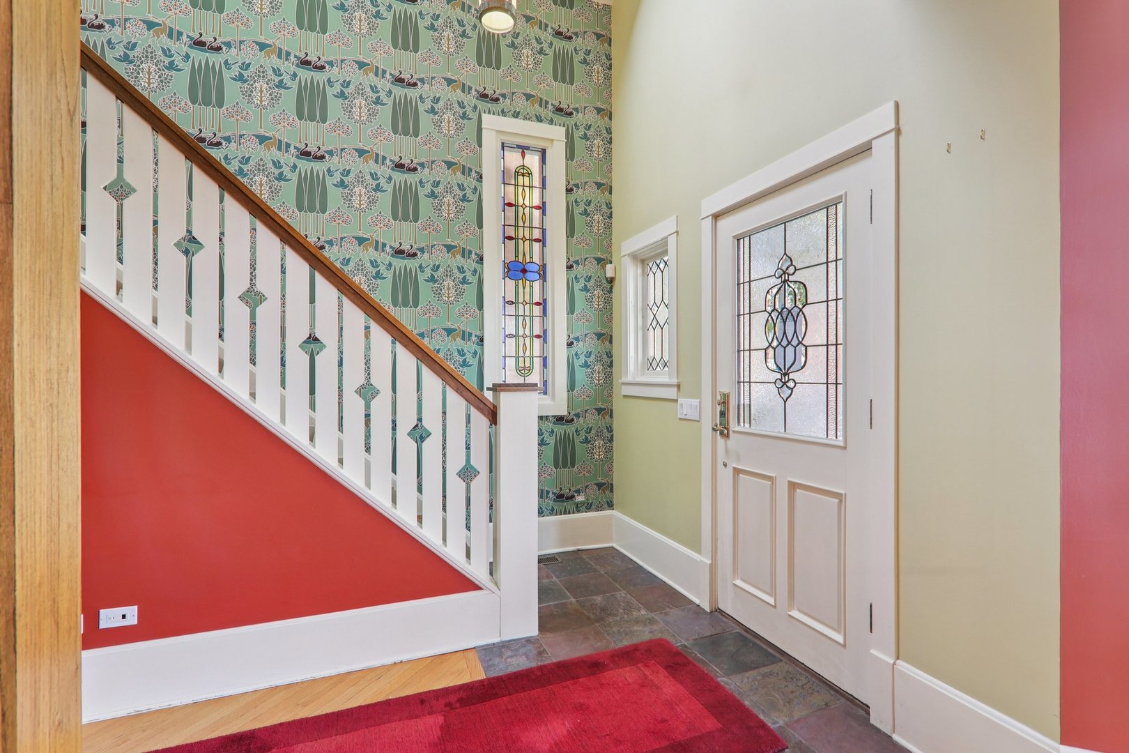 1027 West Newport Avenue Chicago, IL 60657 - Photo 3 of 36 a view of an entryway with staircase