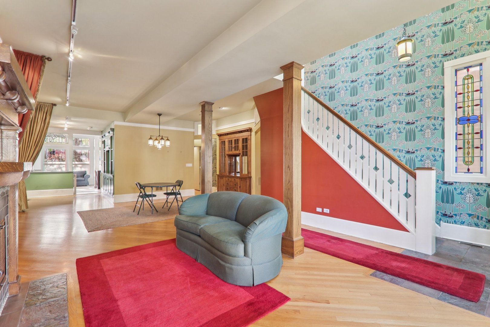 1027 West Newport Avenue Chicago, IL 60657 - Photo 6 of 36 a living room with furniture and wooden floor