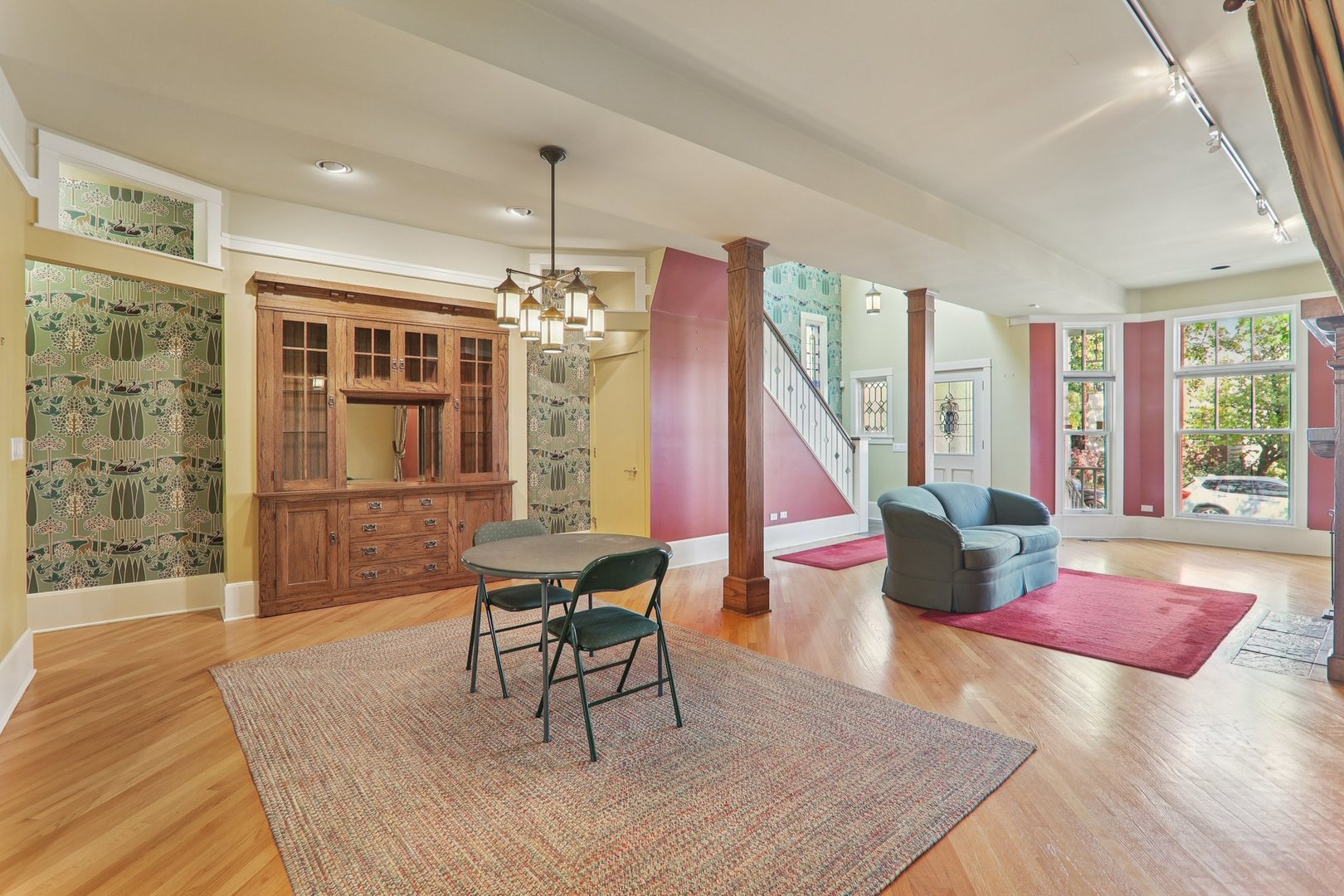 1027 West Newport Avenue Chicago, IL 60657 - Photo 9 of 36 a living room with furniture and a floor to ceiling window