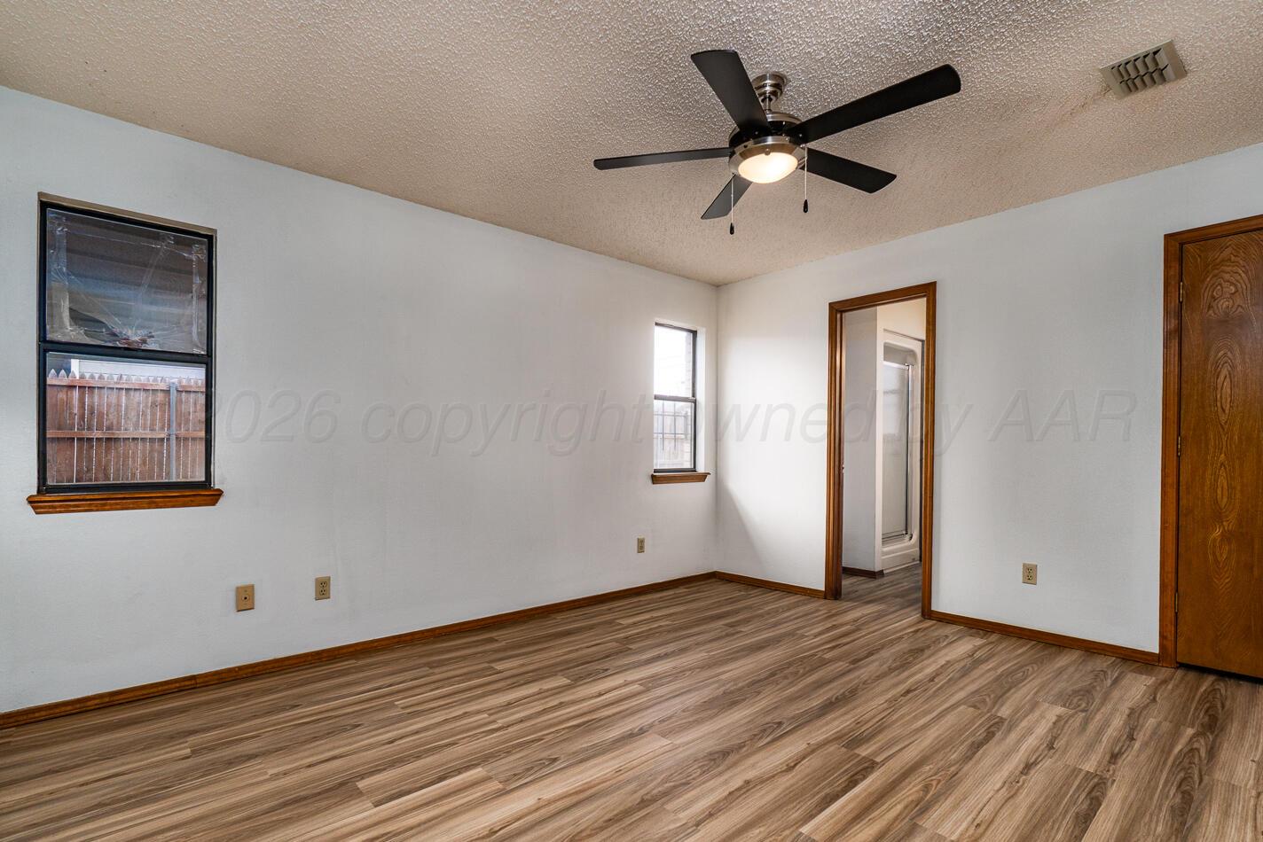 607 Mississippi Street Borger, TX 79007 - Photo 16 of 23 a view of empty room with wooden floor