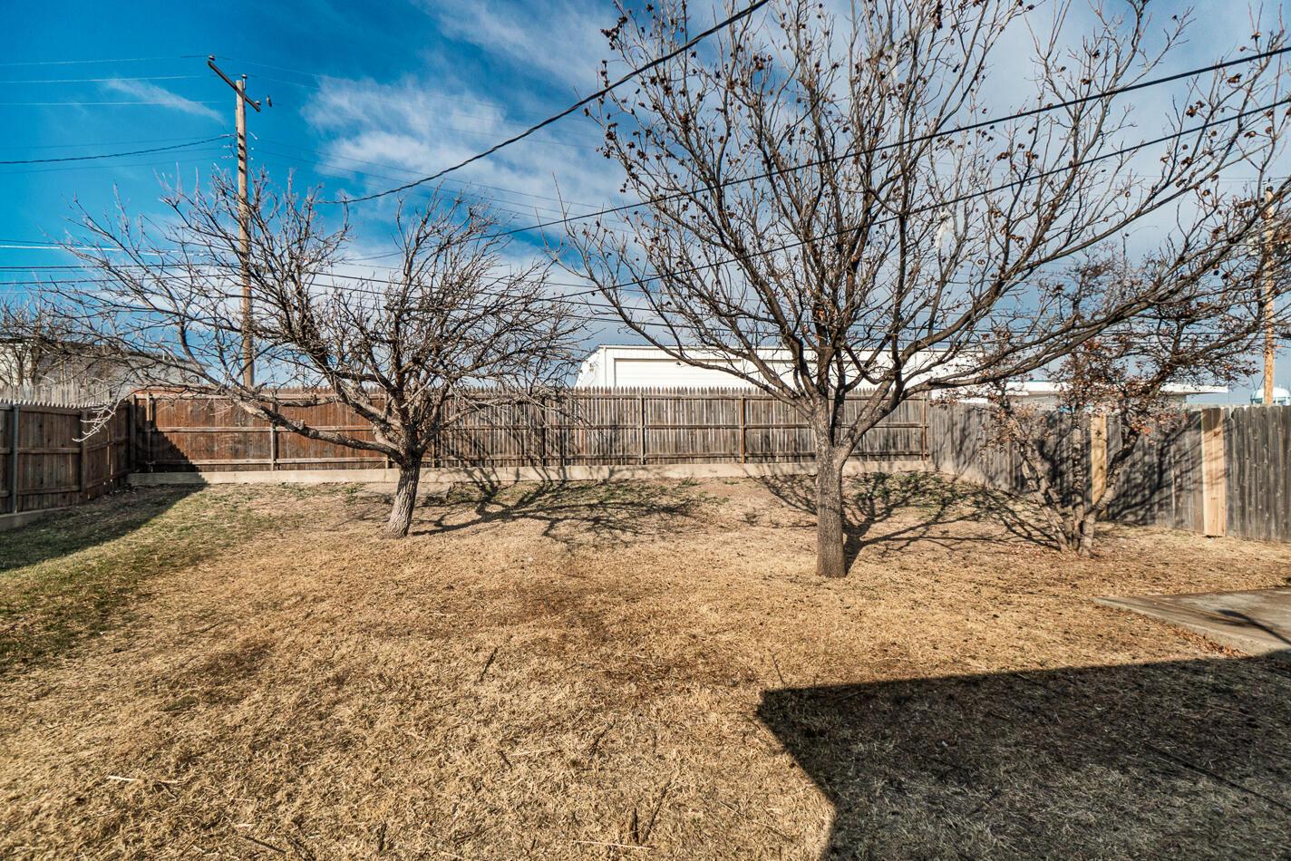 607 Mississippi Street Borger, TX 79007 - Photo 23 of 23 a view of a yard covered with snow