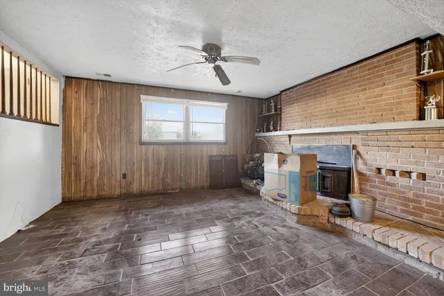 a view of a livingroom with a fireplace