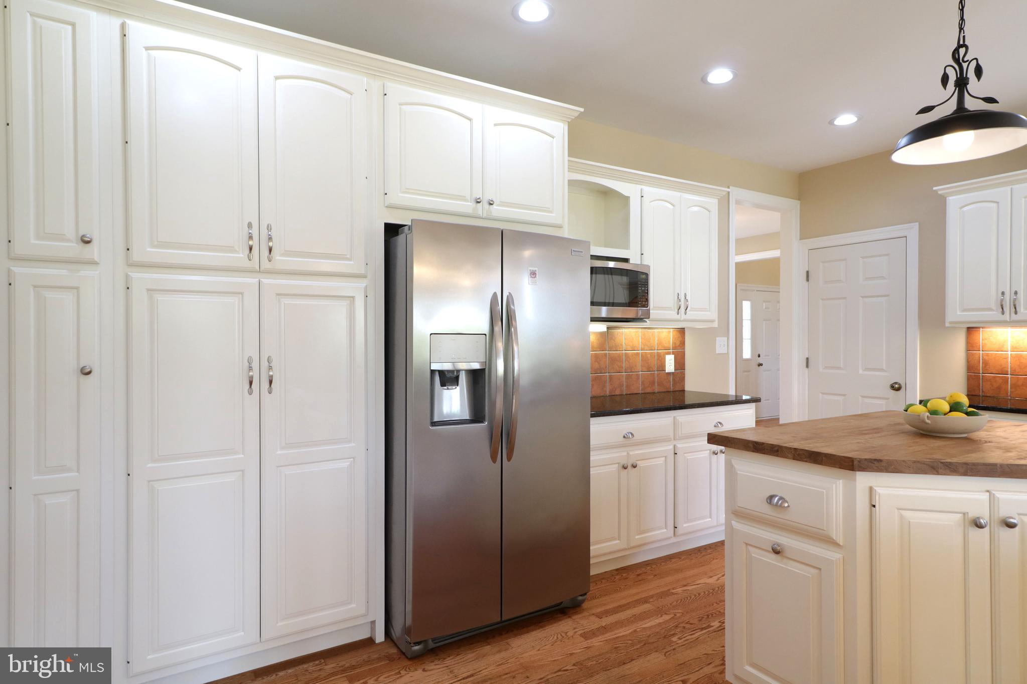 135 Fernleaf Court State College, PA 16801 - Photo 16 of 53 a kitchen with cabinets and stainless steel appliances