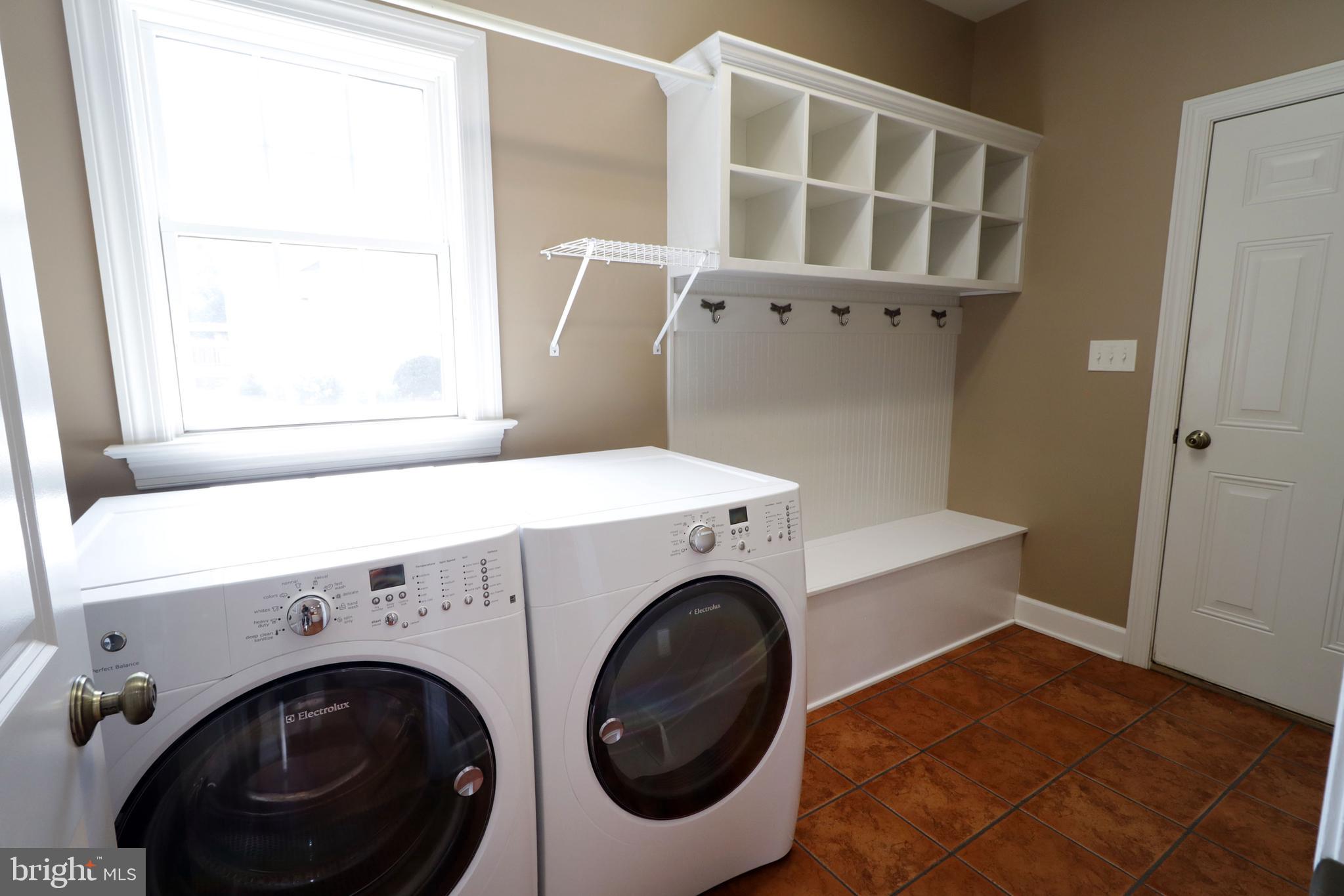 135 Fernleaf Court State College, PA 16801 - Photo 17 of 53 a utility room with dryer and washer