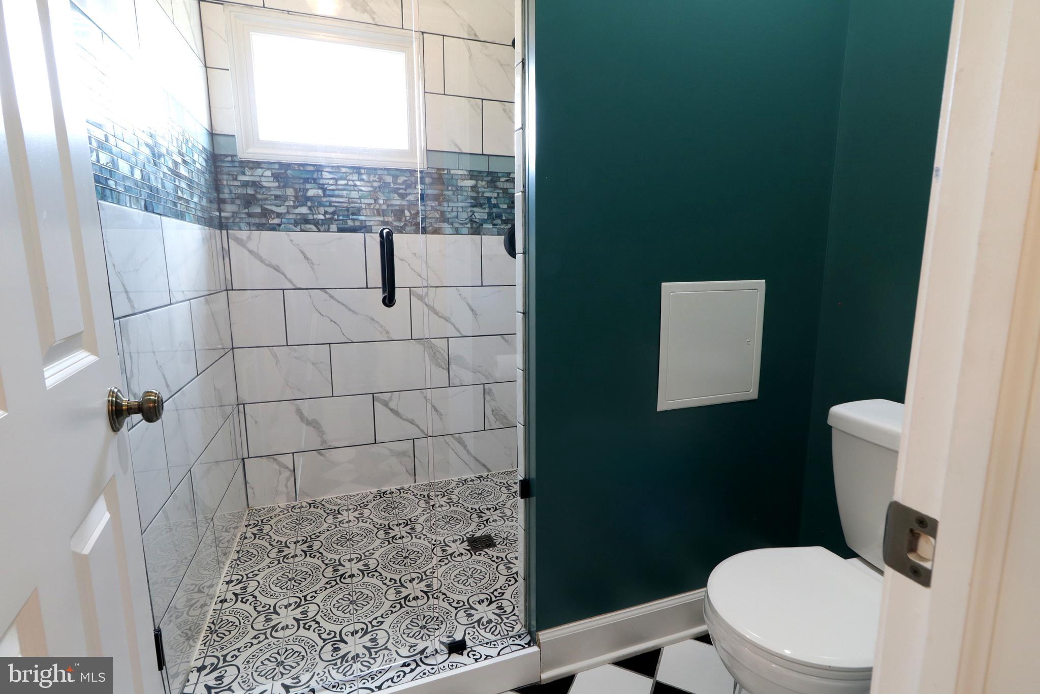 135 Fernleaf Court State College, PA 16801 - Photo 32 of 53 a bathroom with a toilet and a shower
