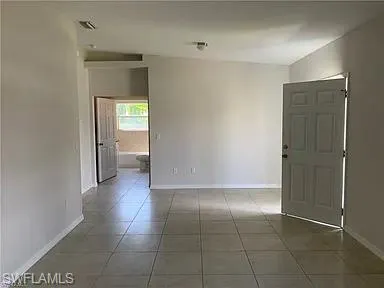 a view of a hallway with closet
