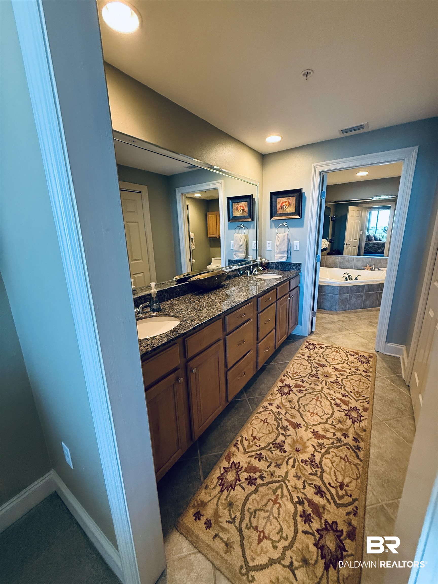 27800 Canal Road, Unit 409 Orange Beach, AL 36561 - Photo 17 of 22 Bathroom with a bath, double vanity, and recessed lighting
