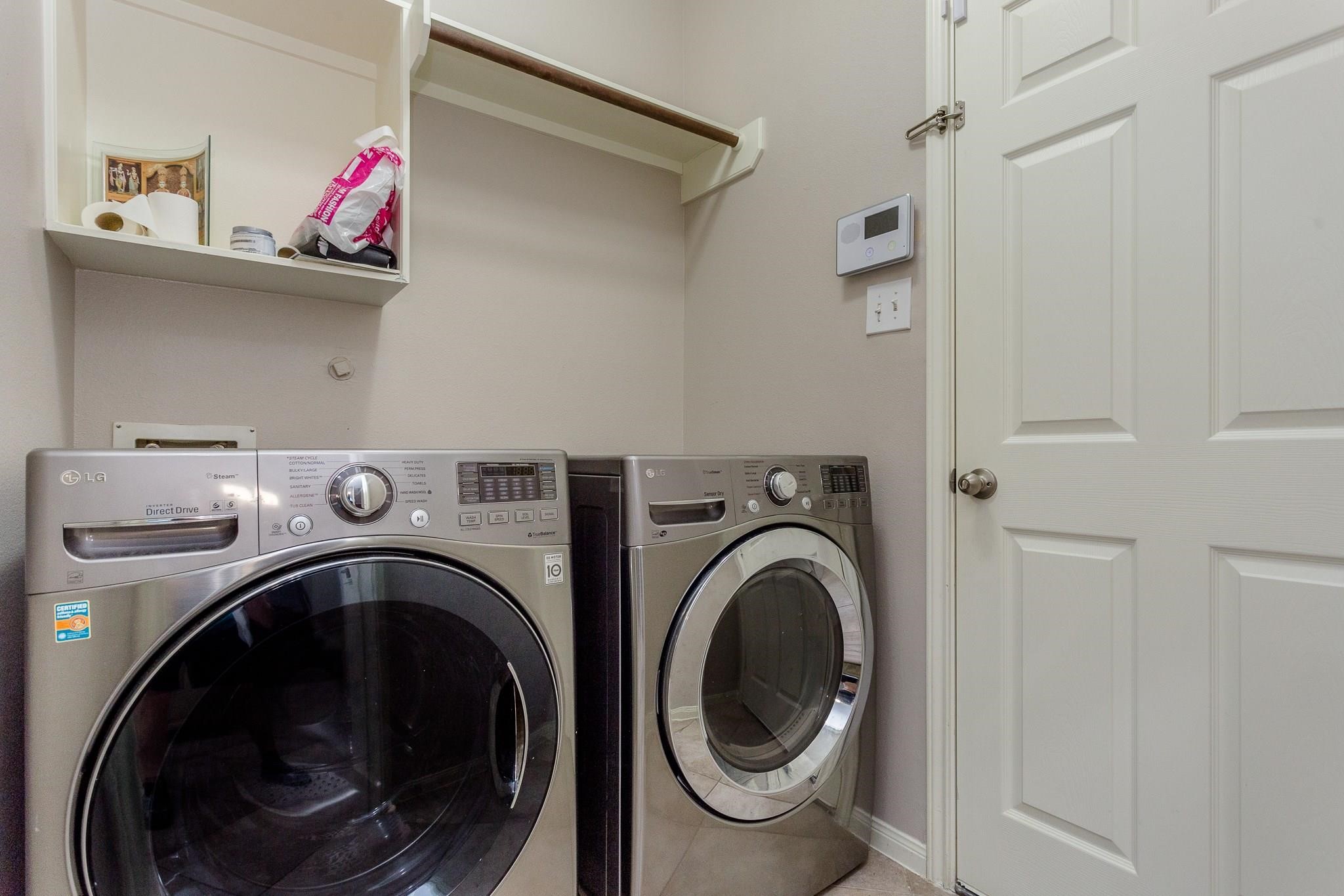 3430 Lilac Ranch Drive Katy, TX 77494 - Photo 10 of 29 a utility room with dryer and washer