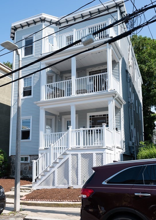 a car parked in front of a building