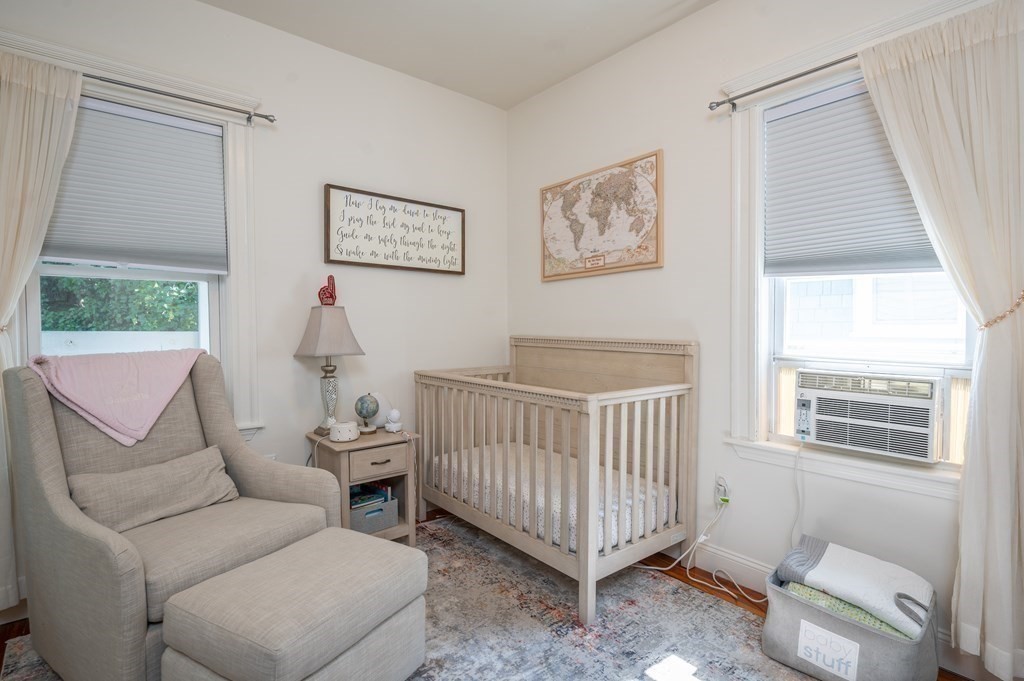 12 Thelma Road, Unit 3 Boston, MA 02122 - Photo 12 of 18 a living room with furniture and a window