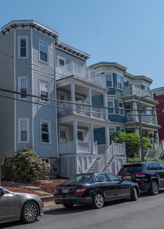 12 Thelma Road, Unit 3 Boston, MA 02122 - Photo 18 of 18 a car parked in front of a house
