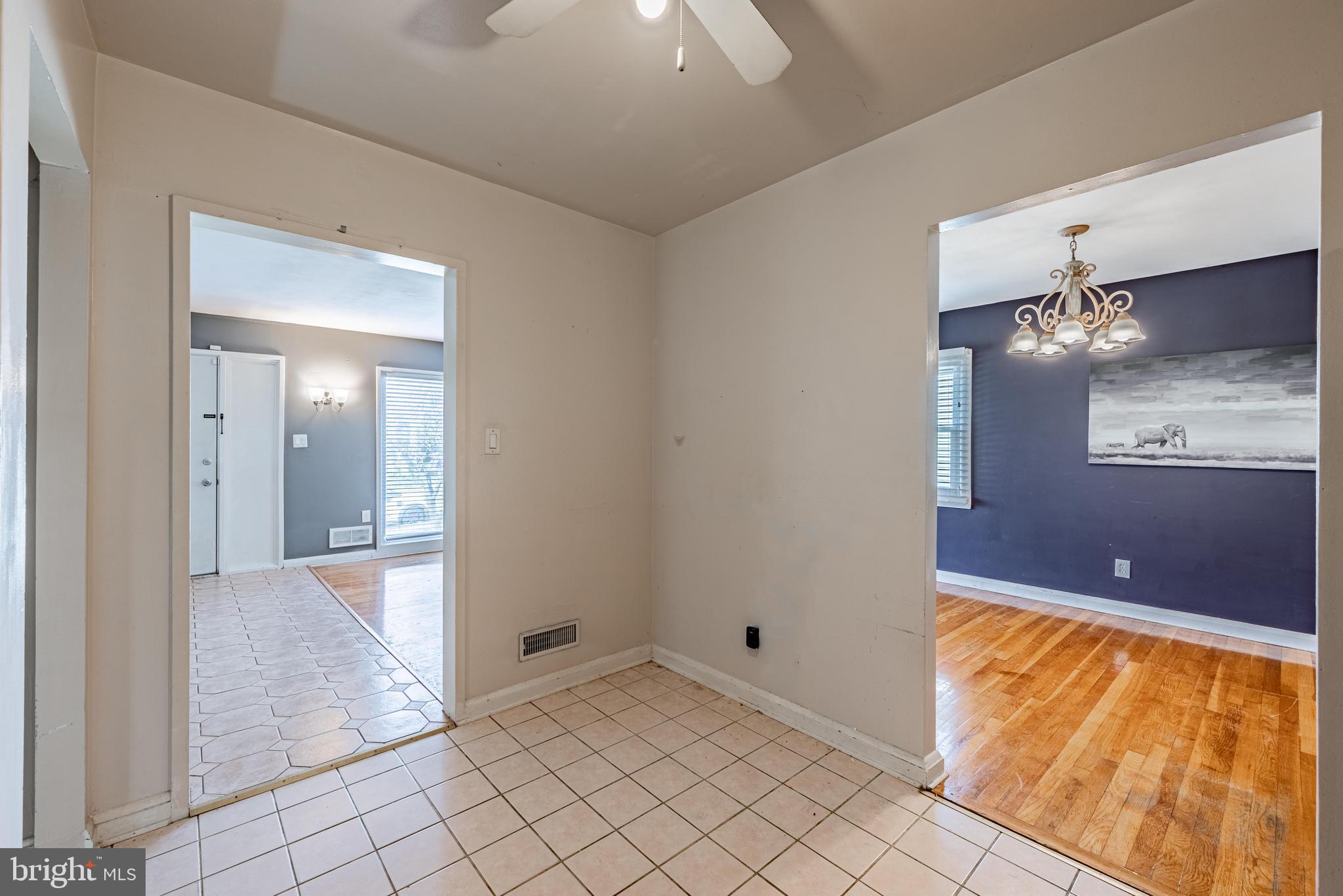 3621 Washington Avenue Baltimore, MD 21244 - Photo 11 of 25 wooden floor in an empty room with a window