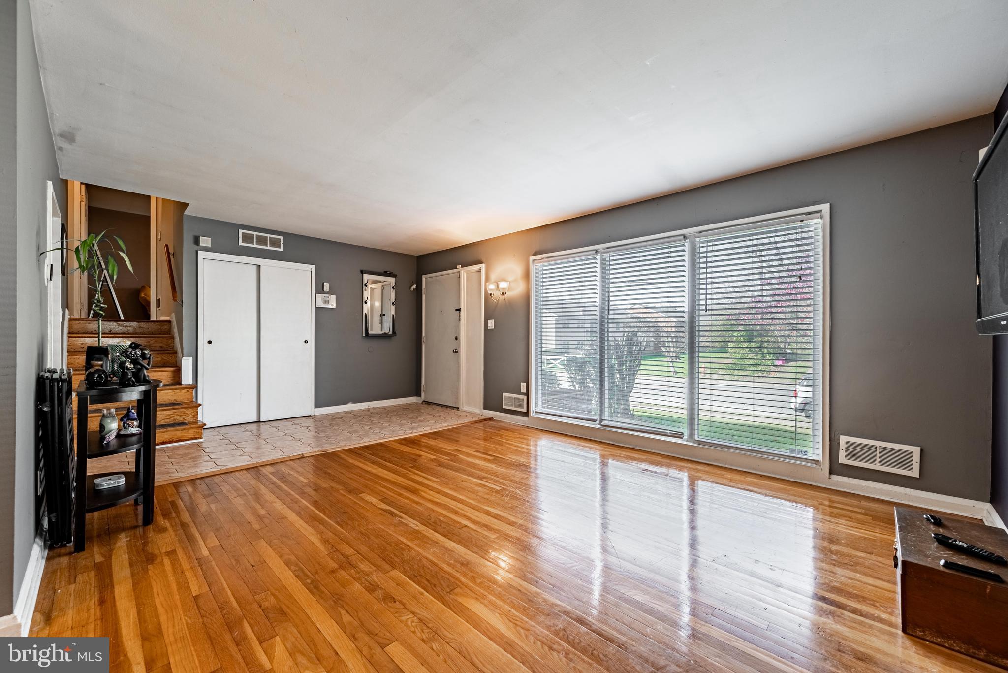 3621 Washington Avenue Baltimore, MD 21244 - Photo 6 of 25 a view of empty room with wooden floor and fan