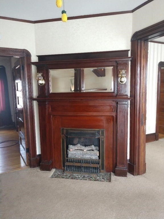 545 Robeson Street Fall River, MA 02720 - Photo 28 of 42 a living room with a fireplace