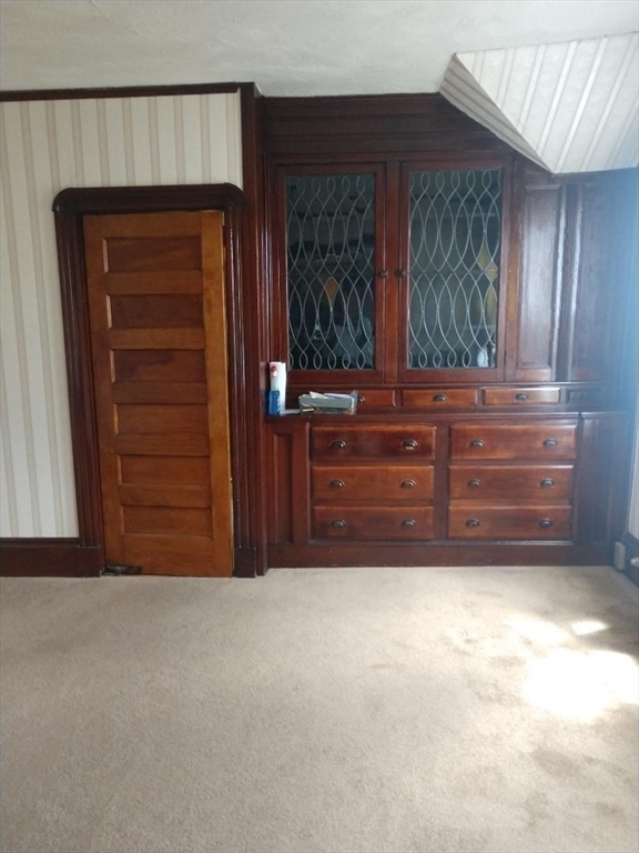 545 Robeson Street Fall River, MA 02720 - Photo 30 of 42 a view of room with closet and cabinet