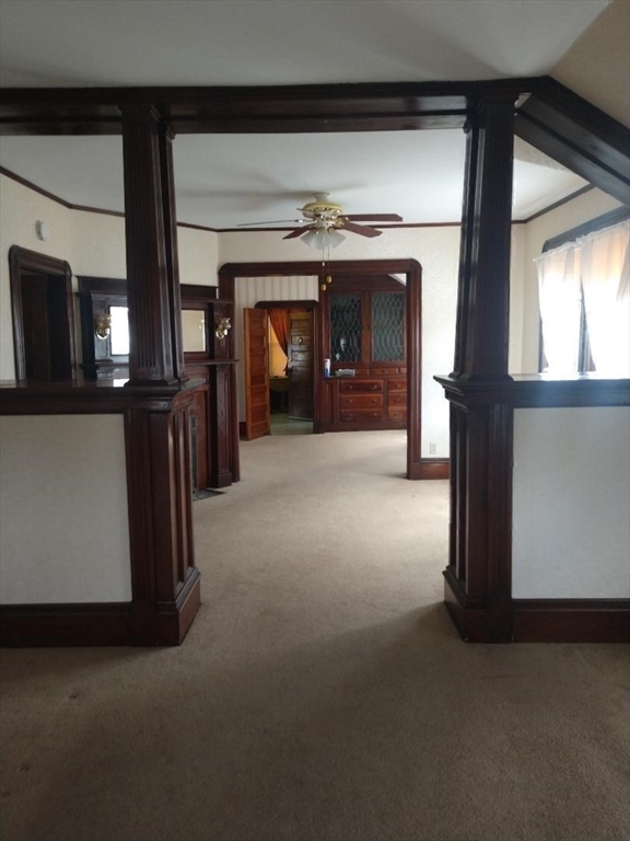 545 Robeson Street Fall River, MA 02720 - Photo 31 of 42 a view of empty room with window and fireplace