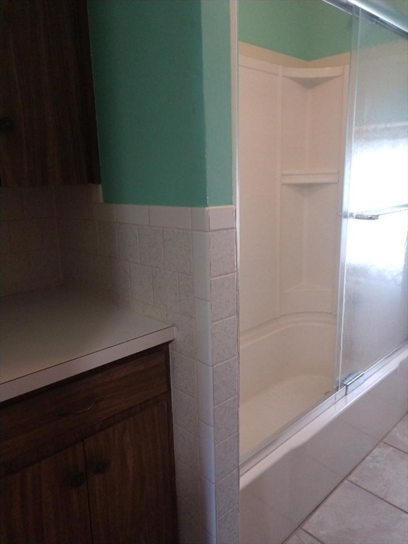 545 Robeson Street Fall River, MA 02720 - Photo 32 of 42 a bathroom with a bathtub