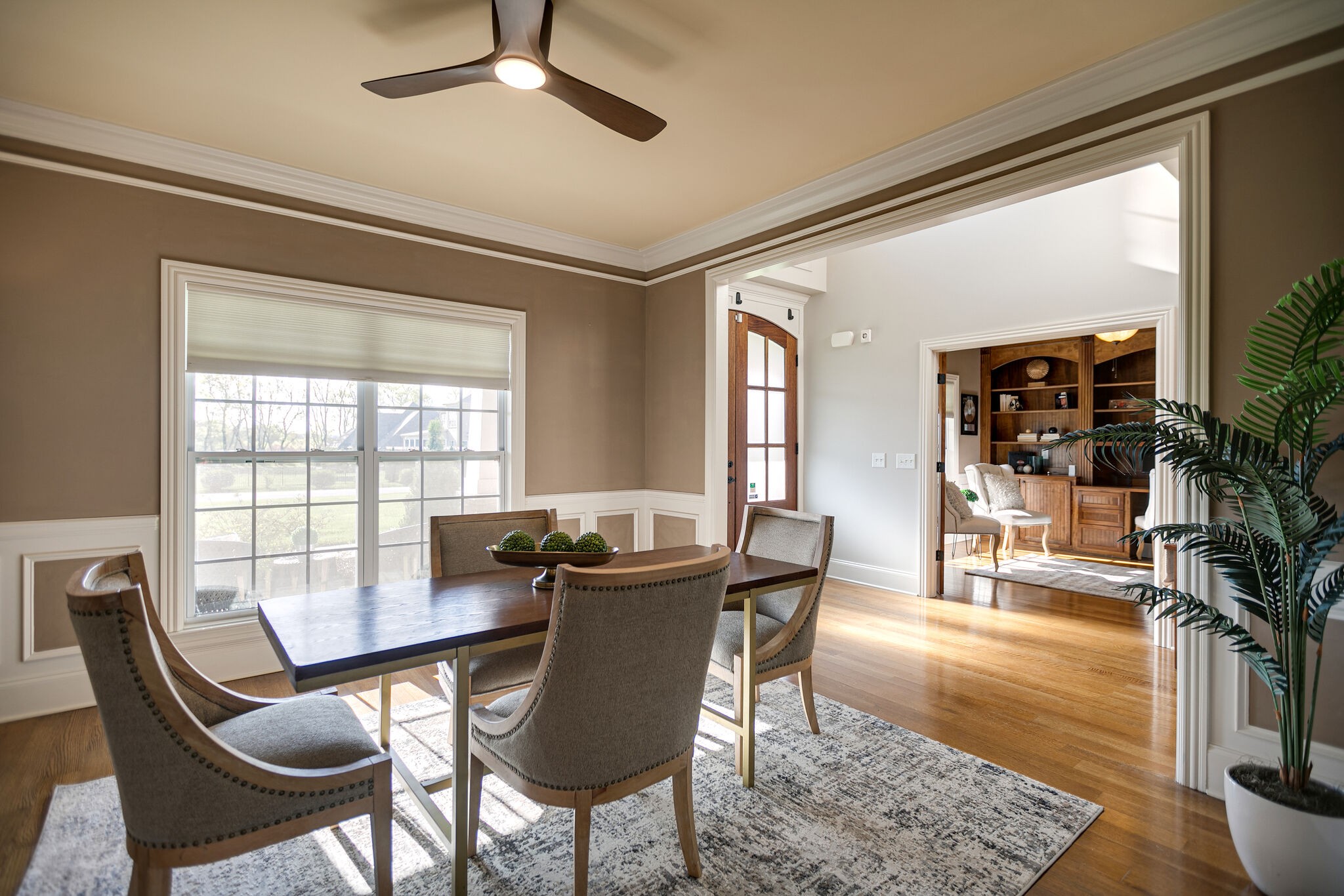 2104 Berry Patch Road Thompson's Station, TN 37064 - Photo 11 of 50 a dining room with furniture window and wooden floor