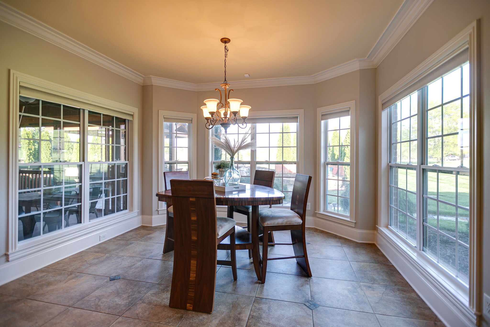 2104 Berry Patch Road Thompson's Station, TN 37064 - Photo 18 of 50 a dining room with furniture a chandelier and wooden floor