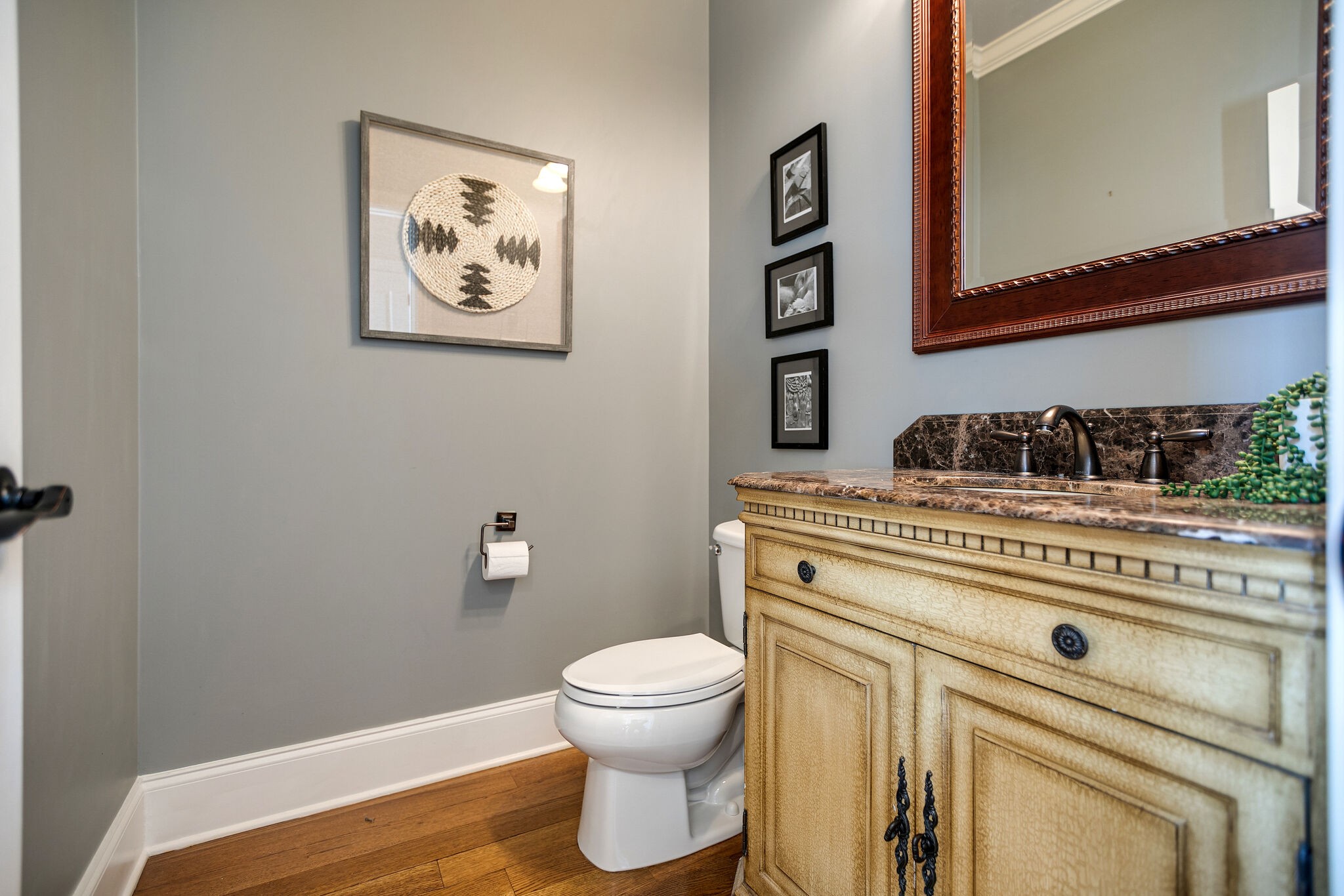 2104 Berry Patch Road Thompson's Station, TN 37064 - Photo 31 of 50 a bathroom with a toilet a sink and a mirror