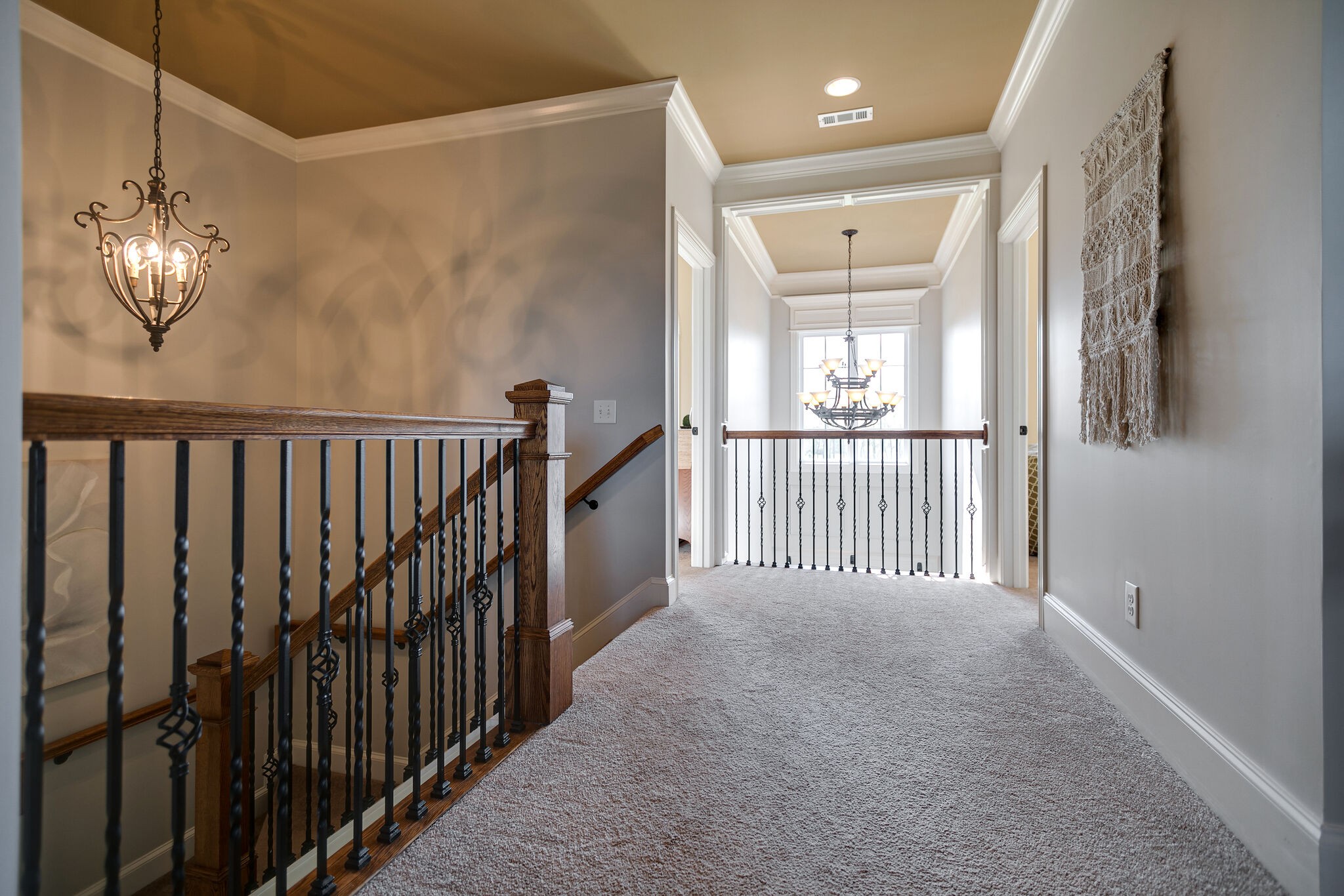 2104 Berry Patch Road Thompson's Station, TN 37064 - Photo 32 of 50 a view of a hallway with windows and a chandelier