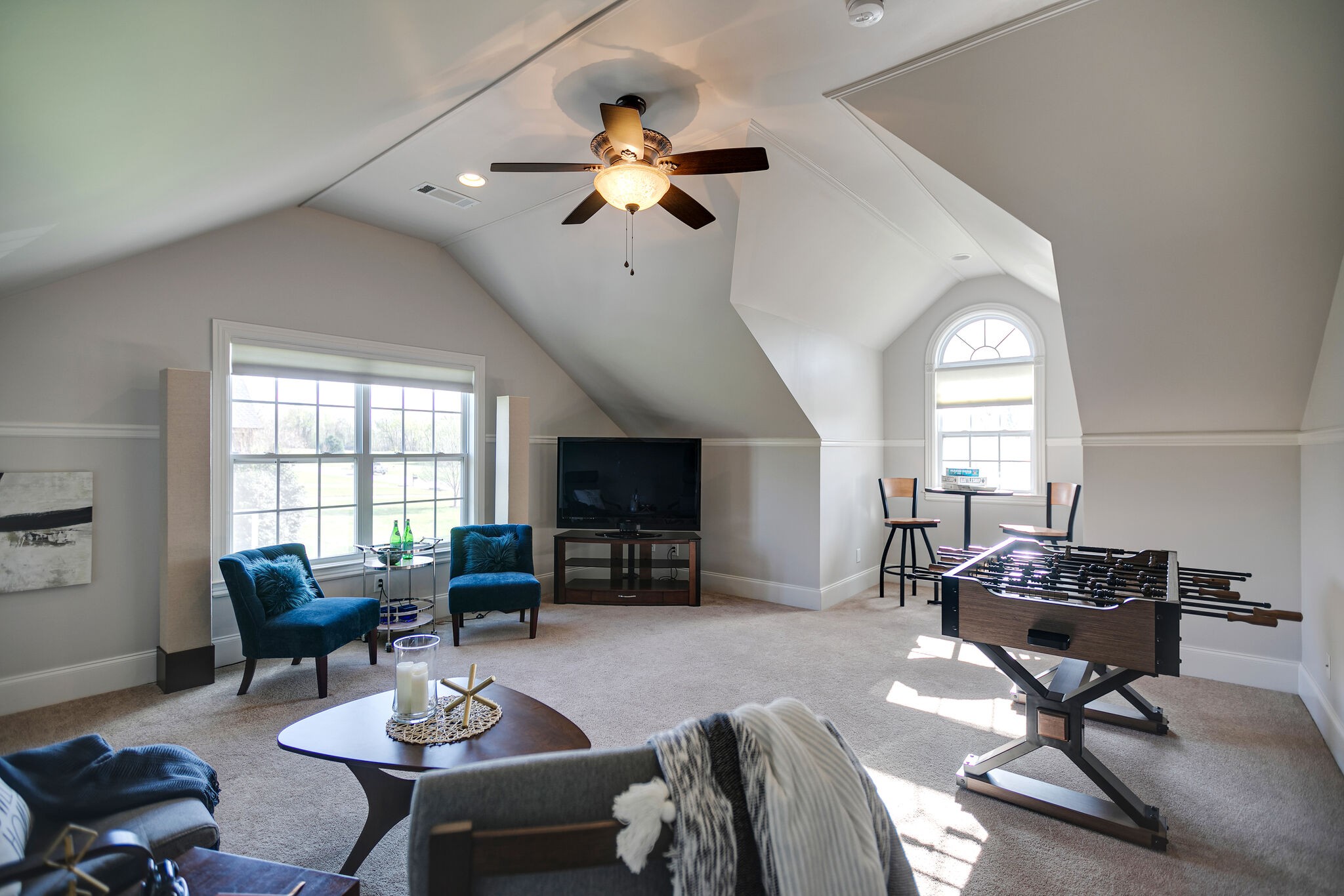 2104 Berry Patch Road Thompson's Station, TN 37064 - Photo 40 of 50 a living room with furniture a chandelier and a window