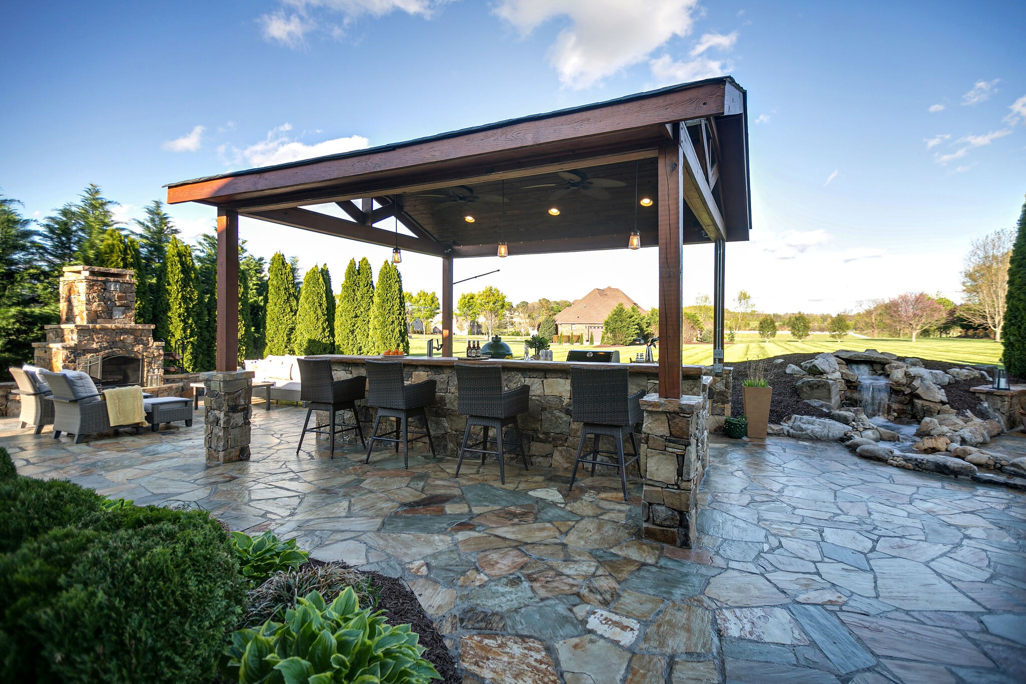 2104 Berry Patch Road Thompson's Station, TN 37064 - Photo 43 of 50 a view of a patio with a table chairs and a patio