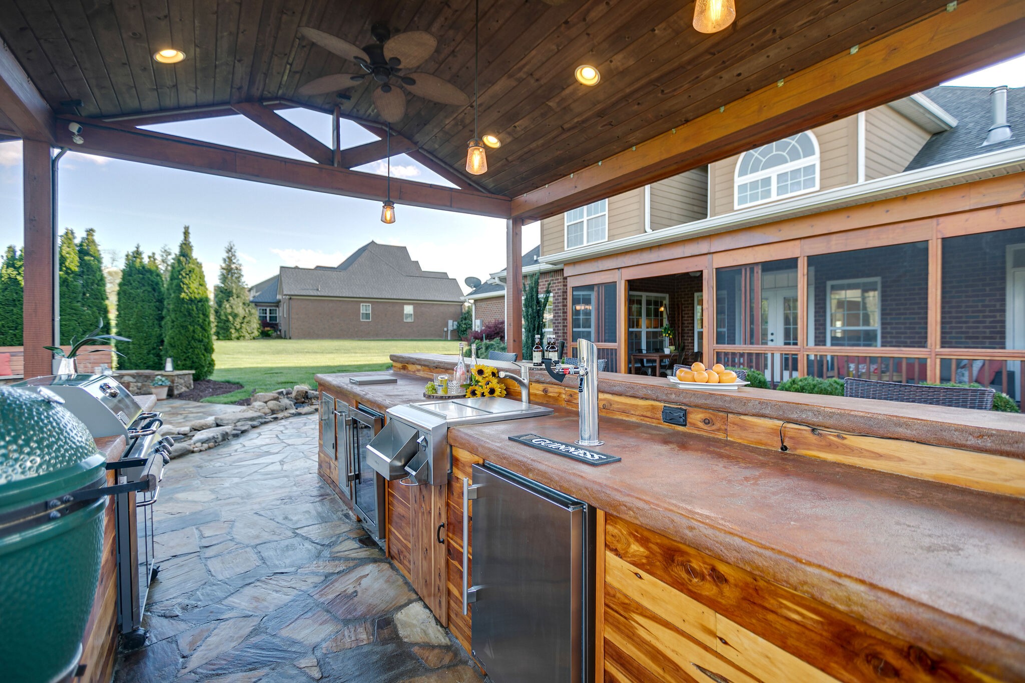2104 Berry Patch Road Thompson's Station, TN 37064 - Photo 44 of 50 a view of a patio with swimming pool table and chairs