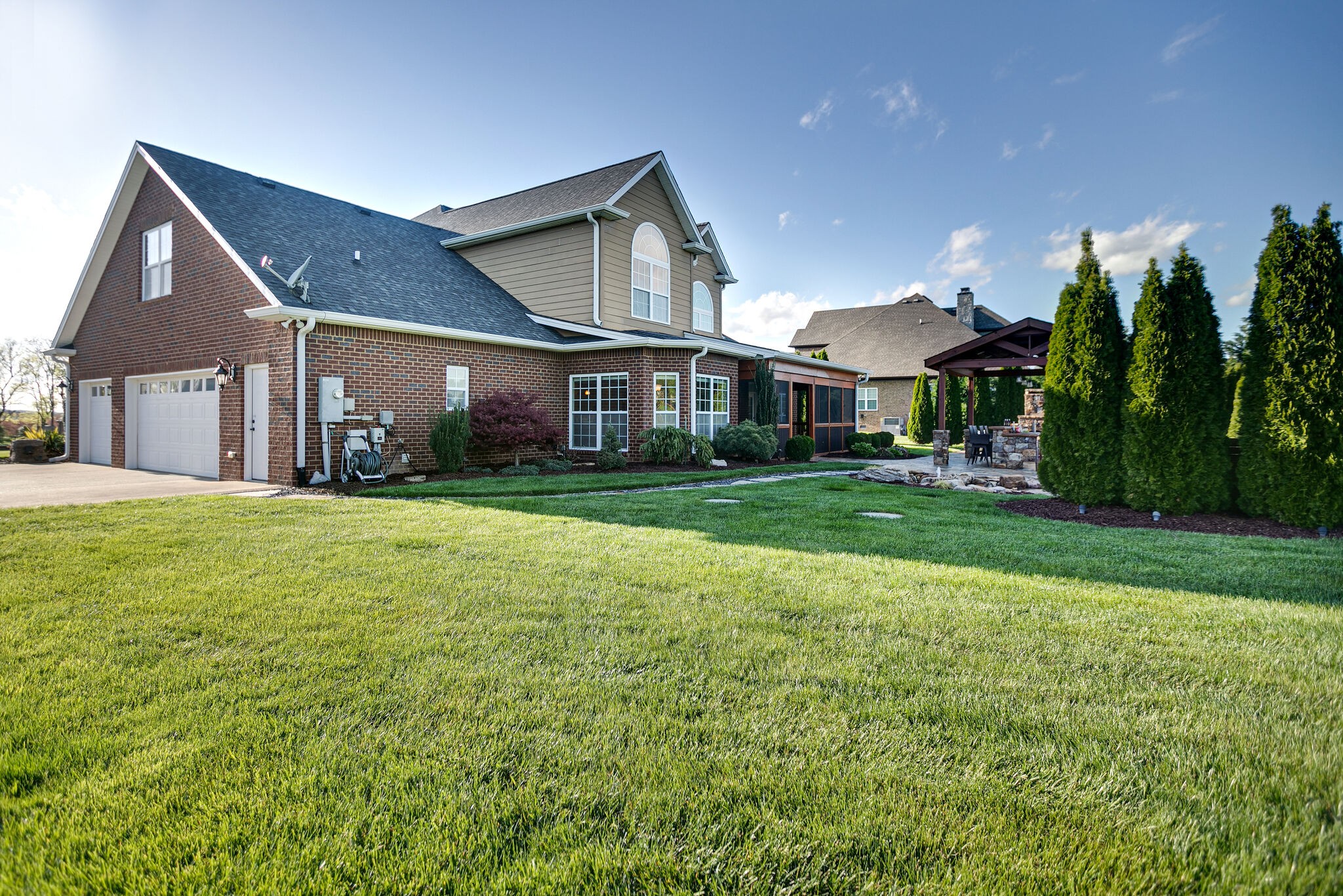 2104 Berry Patch Road Thompson's Station, TN 37064 - Photo 49 of 50 a front view of house with yard and green space