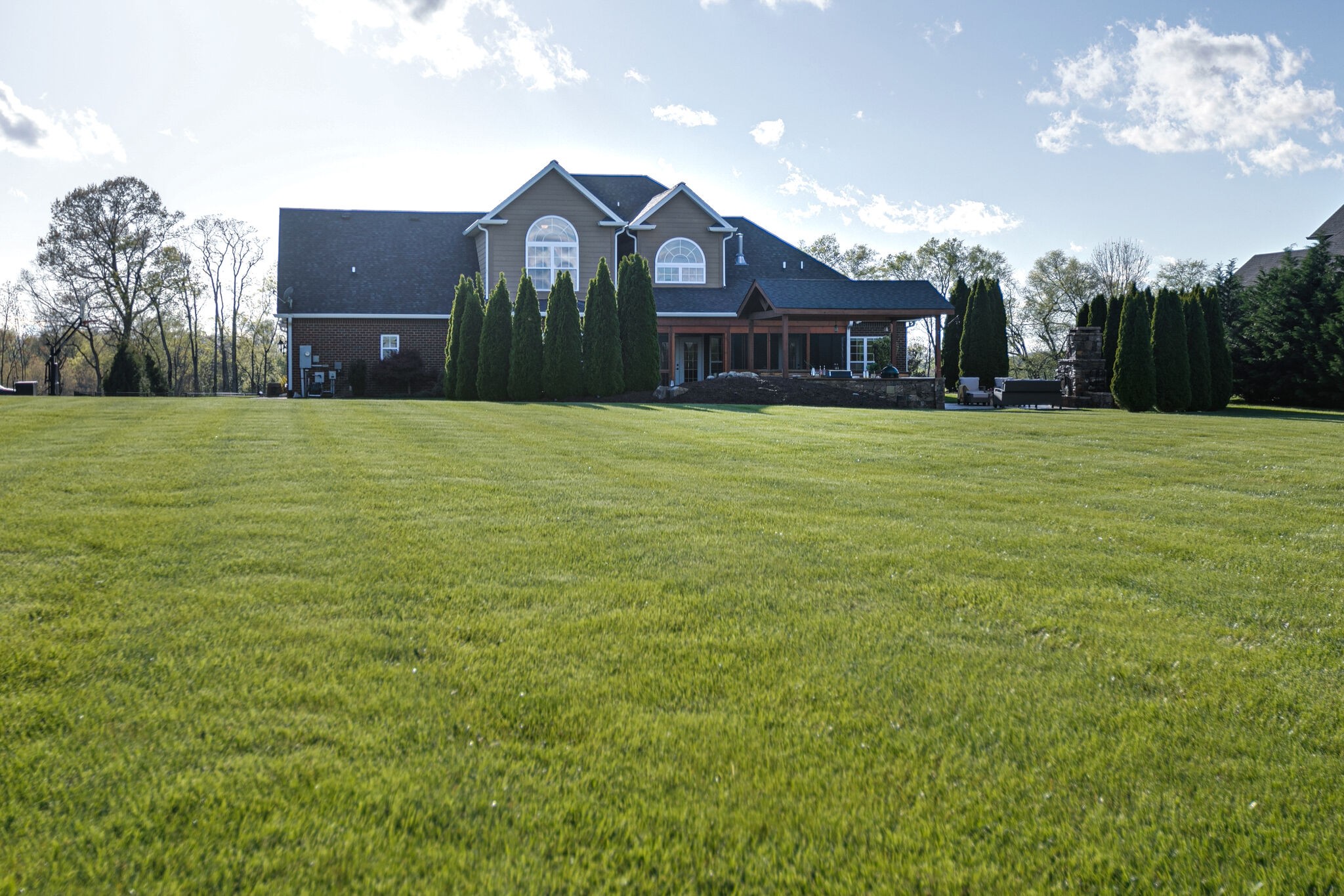 2104 Berry Patch Road Thompson's Station, TN 37064 - Photo 50 of 50 a front view of a house with a garden