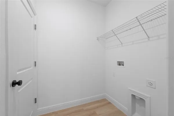 a view of a room with racks on the wall