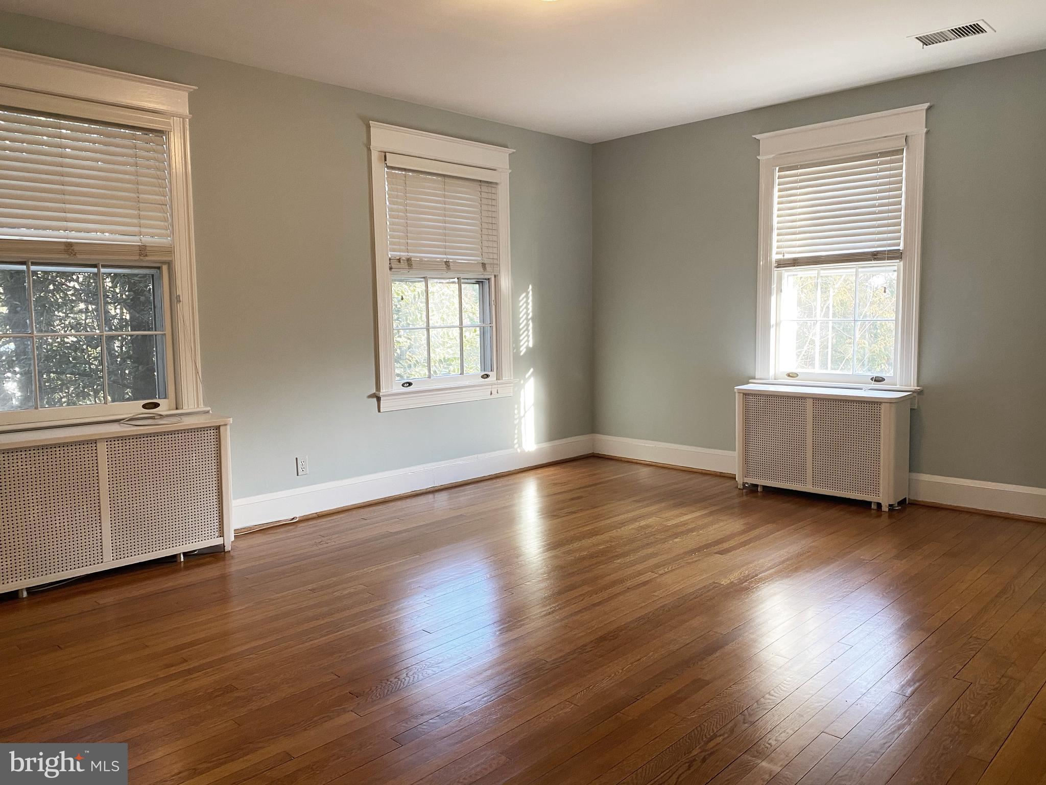 4103 Bradley Lane Chevy Chase, MD 20815 - Photo 5 of 6 Spacious master bedroom, hardwoods + en-suite bath