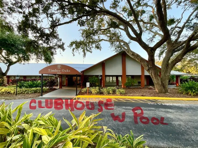a view of swimming pool with a garden