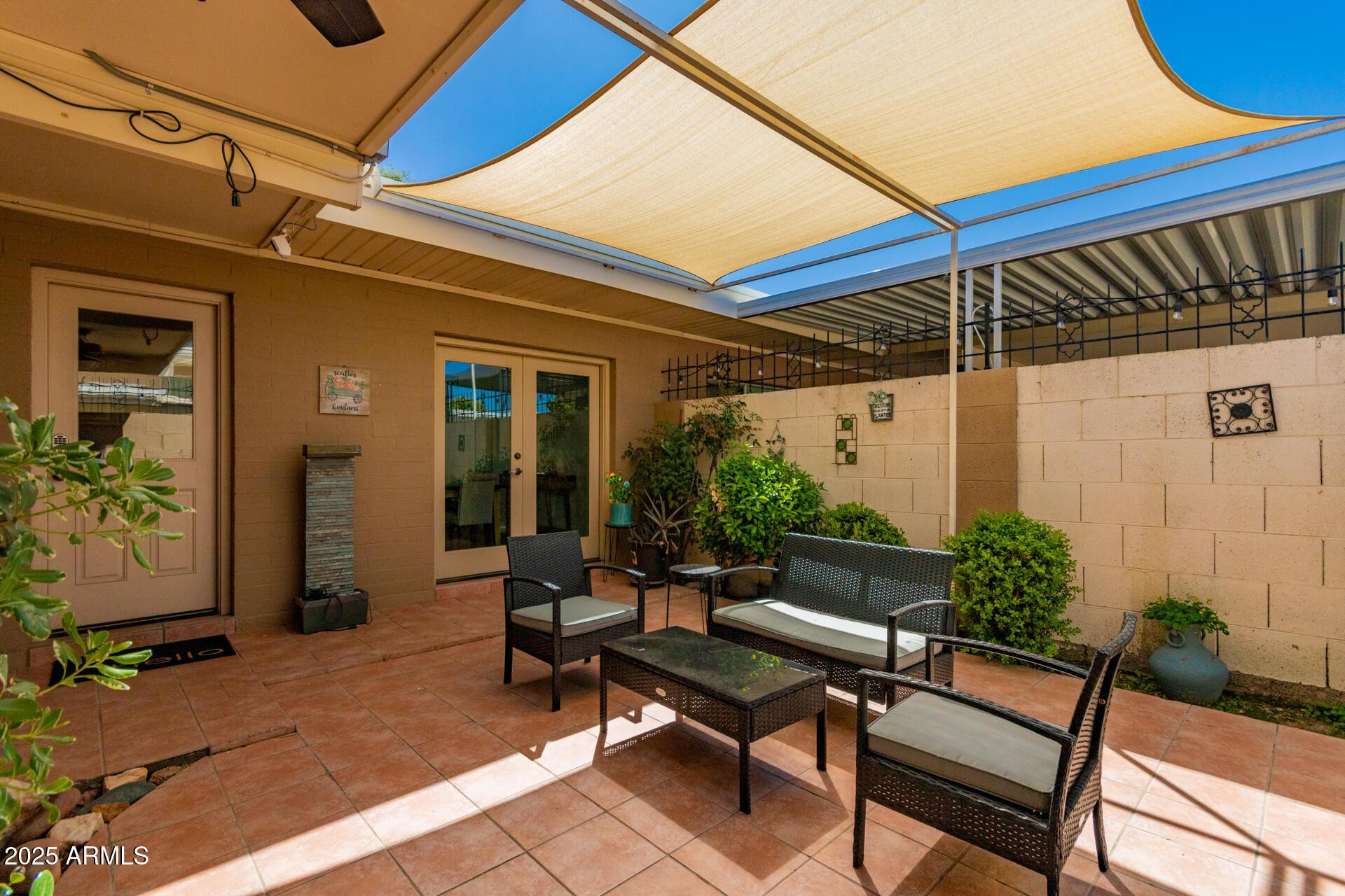 8490 East Chaparral Road Scottsdale, AZ 85250 - Photo 26 of 27 a building outdoor space with patio furniture