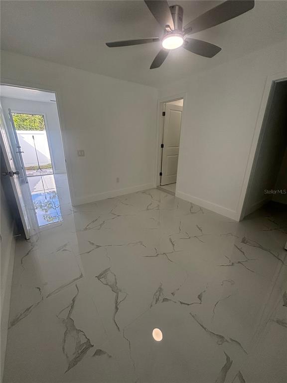 1524 Windermere Road, Unit B Winter Garden, FL 34787 - Photo 6 of 8 a view of an empty room and window