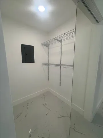 a view of a room with racks on the wall