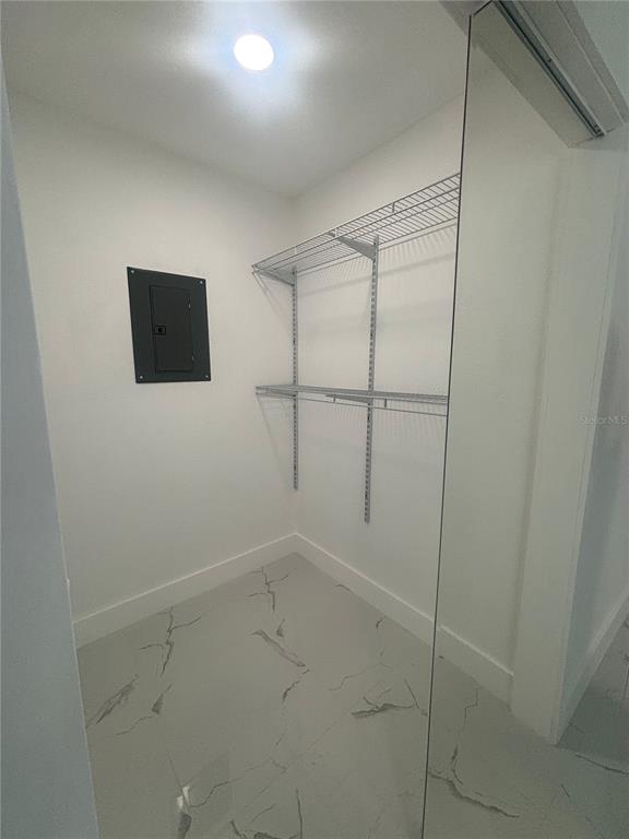 1524 Windermere Road, Unit B Winter Garden, FL 34787 - Photo 7 of 8 a view of a room with racks on the wall