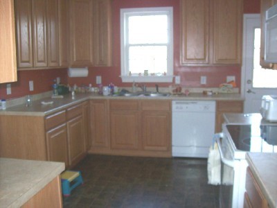 4540 Providence Church Road Ferrum, VA 24088 - Photo 4 of 9 a kitchen with sink cabinets and window